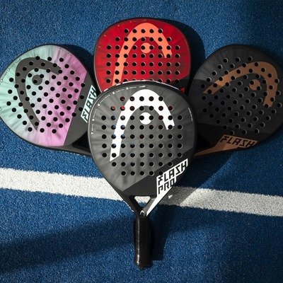 Multiple Padel Rackets on a Ground