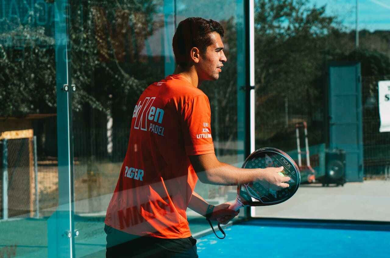 Fiberglass vs Carbon Padel Rackets: Which Is Best in 2025? 2 Player using carbon padel racket on the court