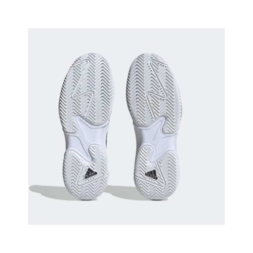 The herringbone sole of the Adidas Barricade clay padel shoe, designed for maximum grip