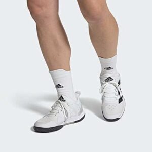 Player wearing Adidas Adizero Ubersonic 4 mens padel shoes on court ready position